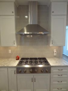 kitchen-hood-and-tile-backsplash-